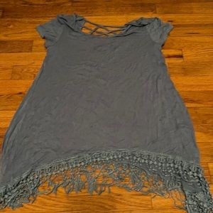 Baby blue tee shirt with fringed bottom
